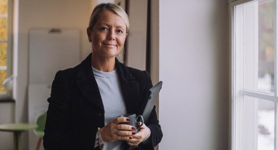 Kvinna i fullmäktige.