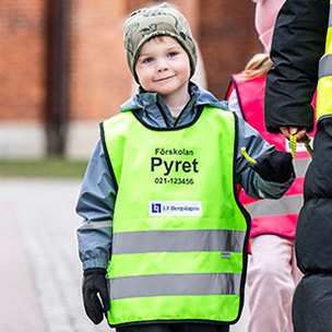 Barn med reflexvästar